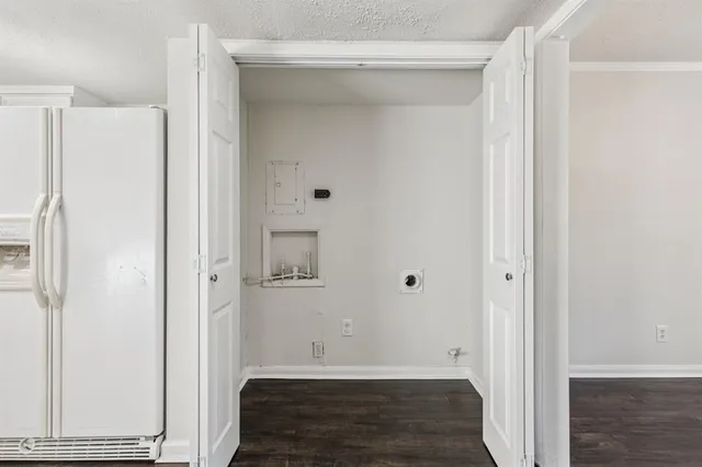a view of a bathroom with wooden floor