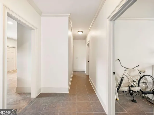 a view of a hallway with closet area