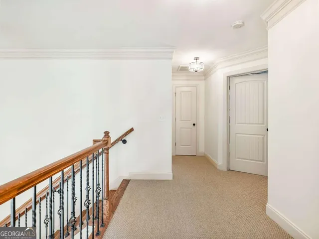 a view of a hallway with closet