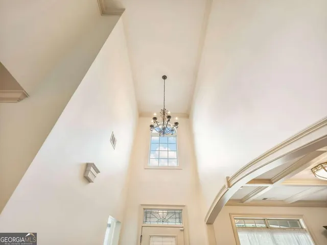 a view of a hallway with windows