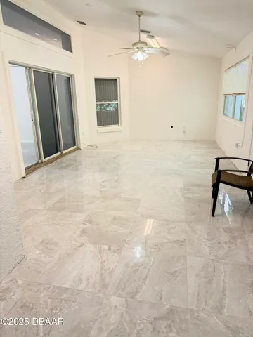 a bathroom with a granite countertop toilet a sink and a bathtub