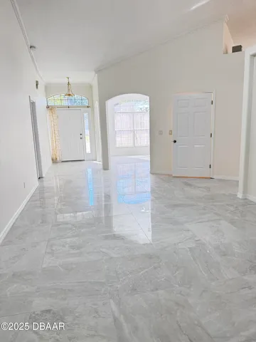 a kitchen with stainless steel appliances granite countertop a sink a stove a microwave and cabinets