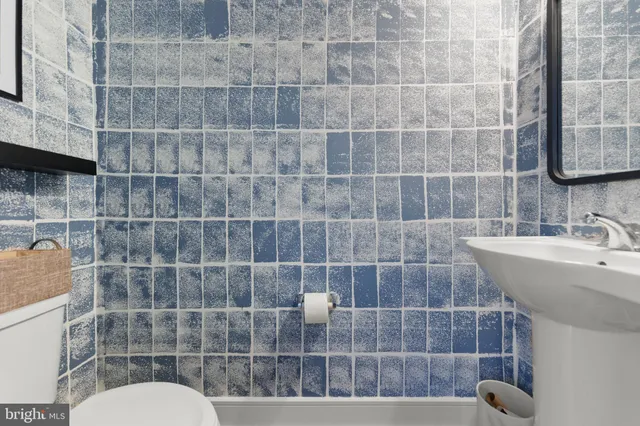 a bathroom with a sink a toilet