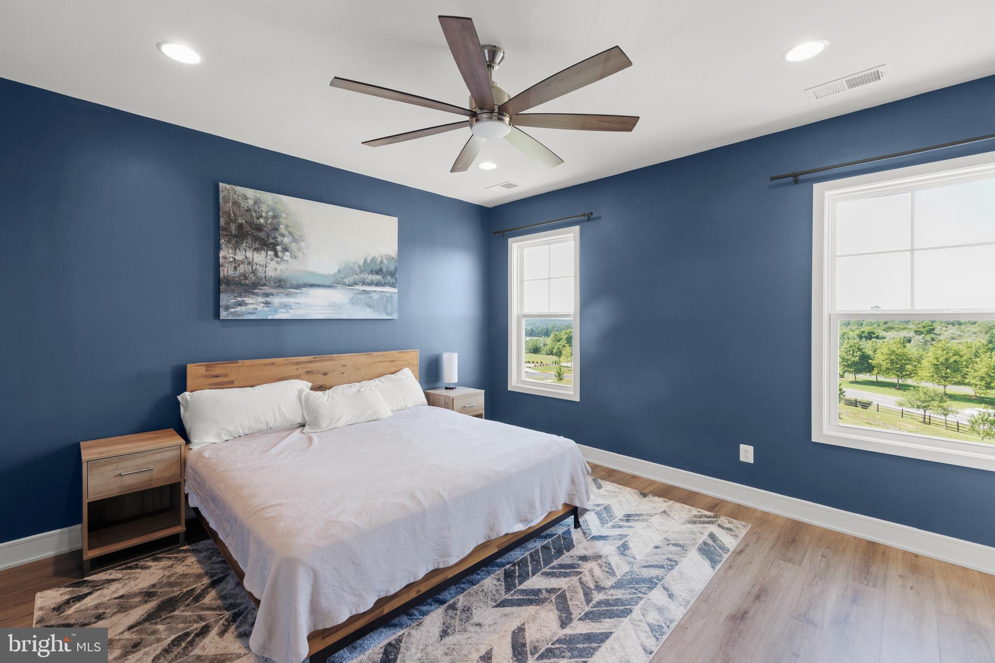 102 Phacelia Way Lake Front Royal, VA 22630 - Photo 17 of 29 a bedroom with a large bed and a window