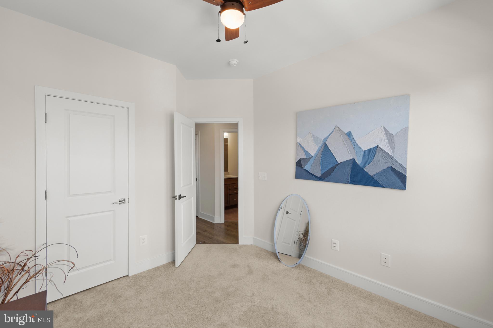 102 Phacelia Way Lake Front Royal, VA 22630 - Photo 22 of 29 an empty room with fan and windows