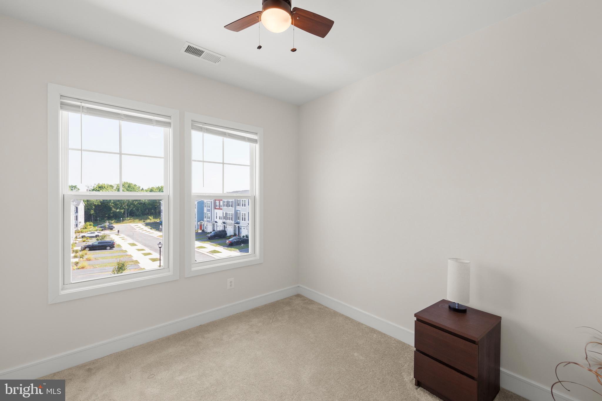 102 Phacelia Way Lake Front Royal, VA 22630 - Photo 23 of 29 an empty room with windows and closet