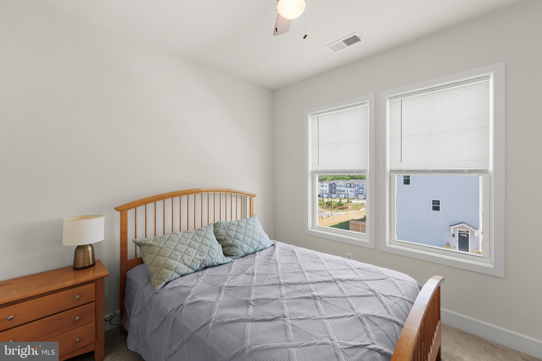 102 Phacelia Way Lake Front Royal, VA 22630 - Photo 25 of 29 a bedroom with a bed and a window