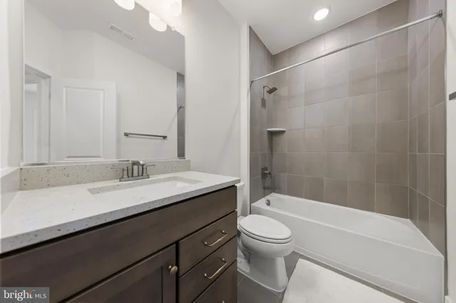 a view of a city street with a road and a building