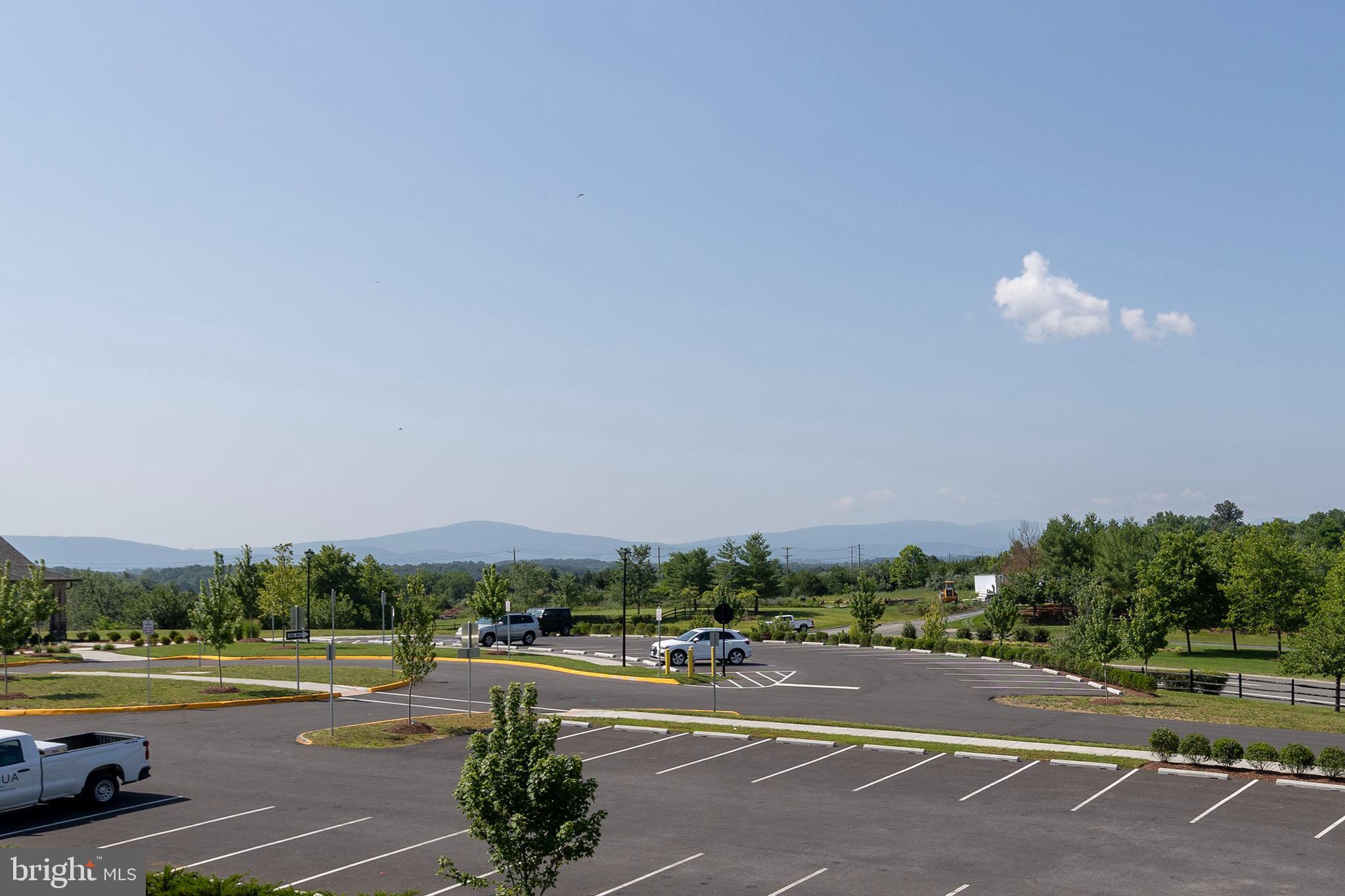 102 Phacelia Way Lake Front Royal, VA 22630 - Photo 27 of 29 a view of a city street with a road and a building