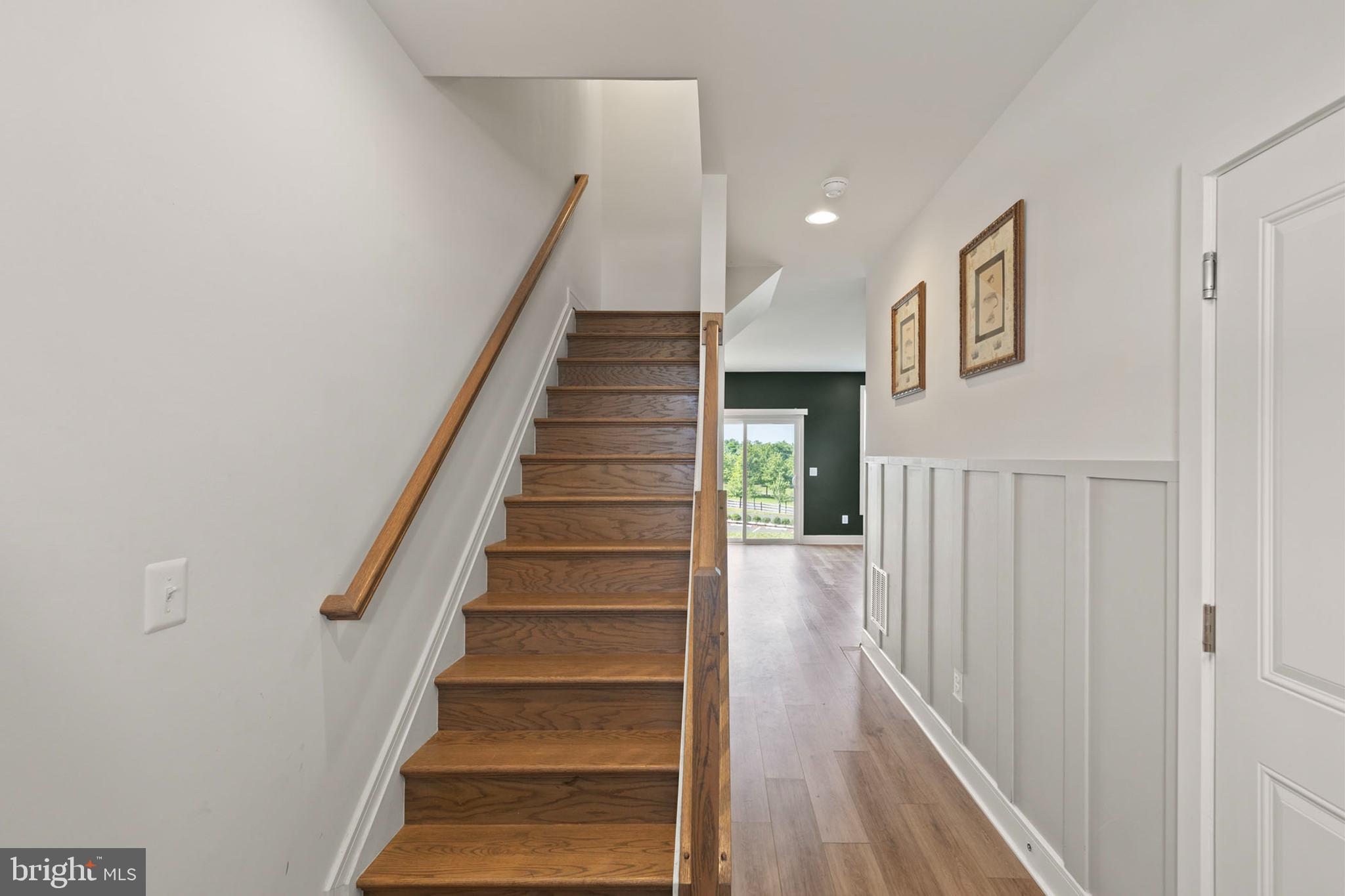 102 Phacelia Way Lake Front Royal, VA 22630 - Photo 7 of 29 a view of entryway and hall with wooden floor