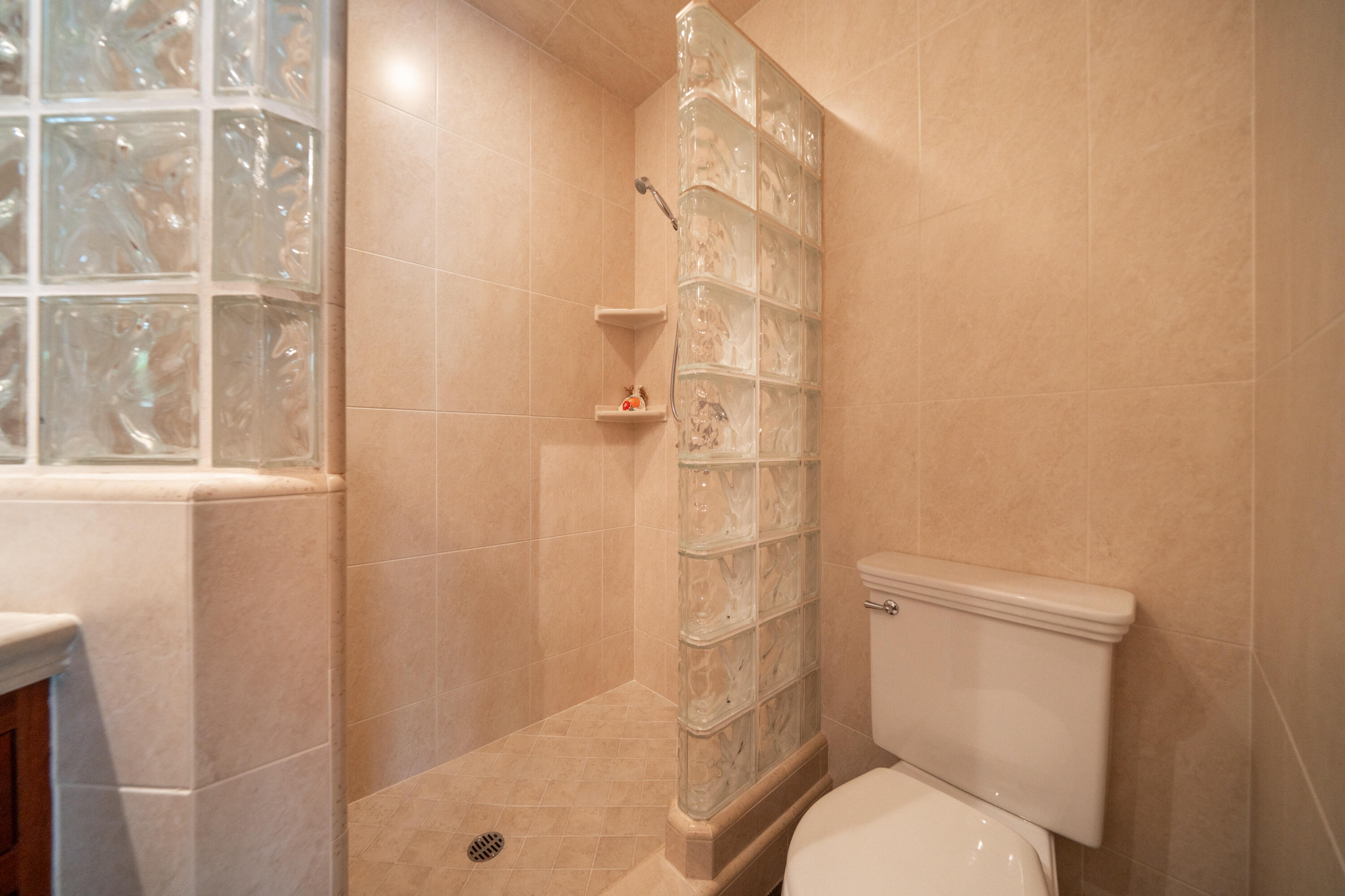 15900 El Camino Robles Road Redding, CA 96001 - Photo 49 of 116 a white toilet sitting next to a bathroom sink