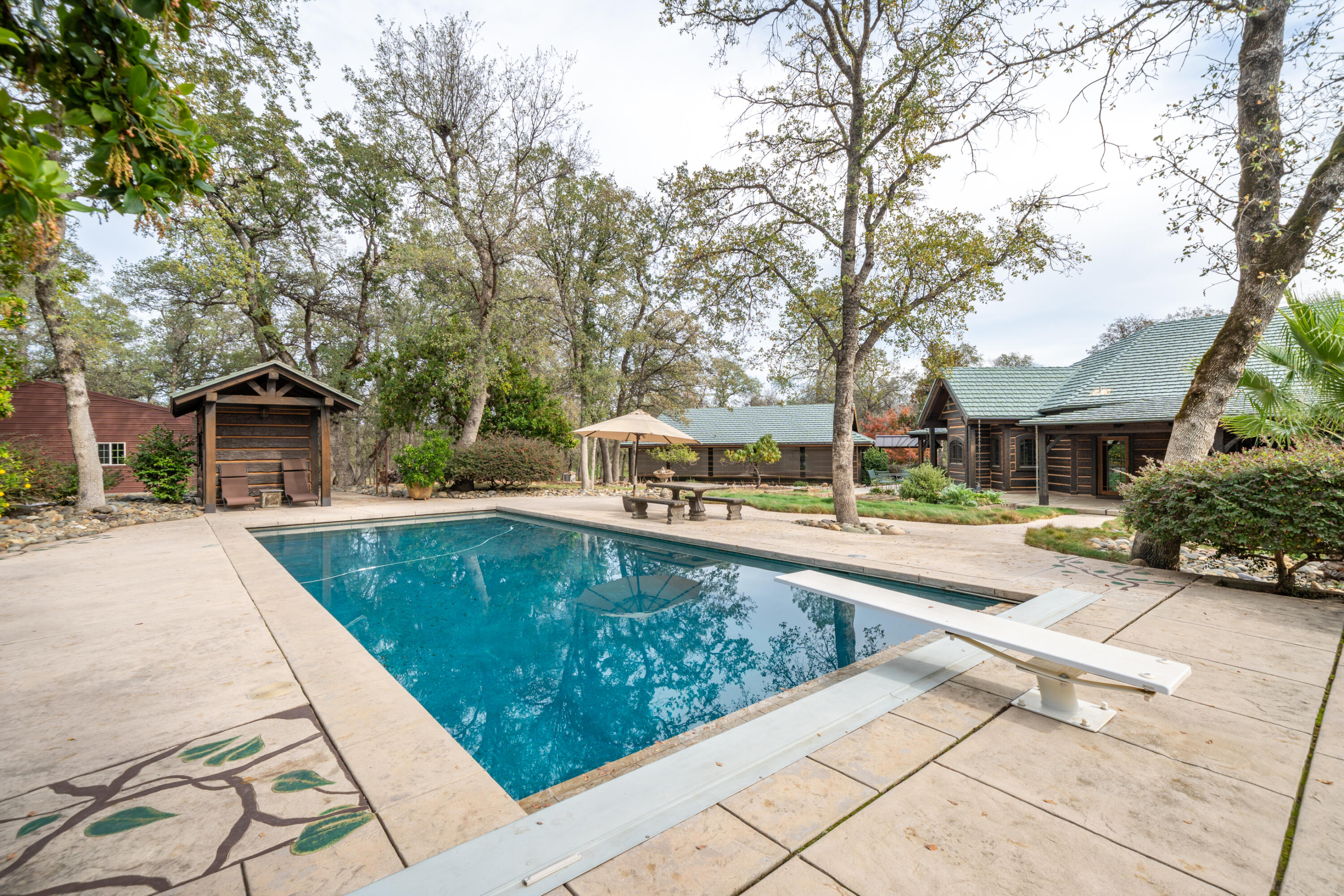 15900 El Camino Robles Road Redding, CA 96001 - Photo 81 of 117 a view of a house with pool