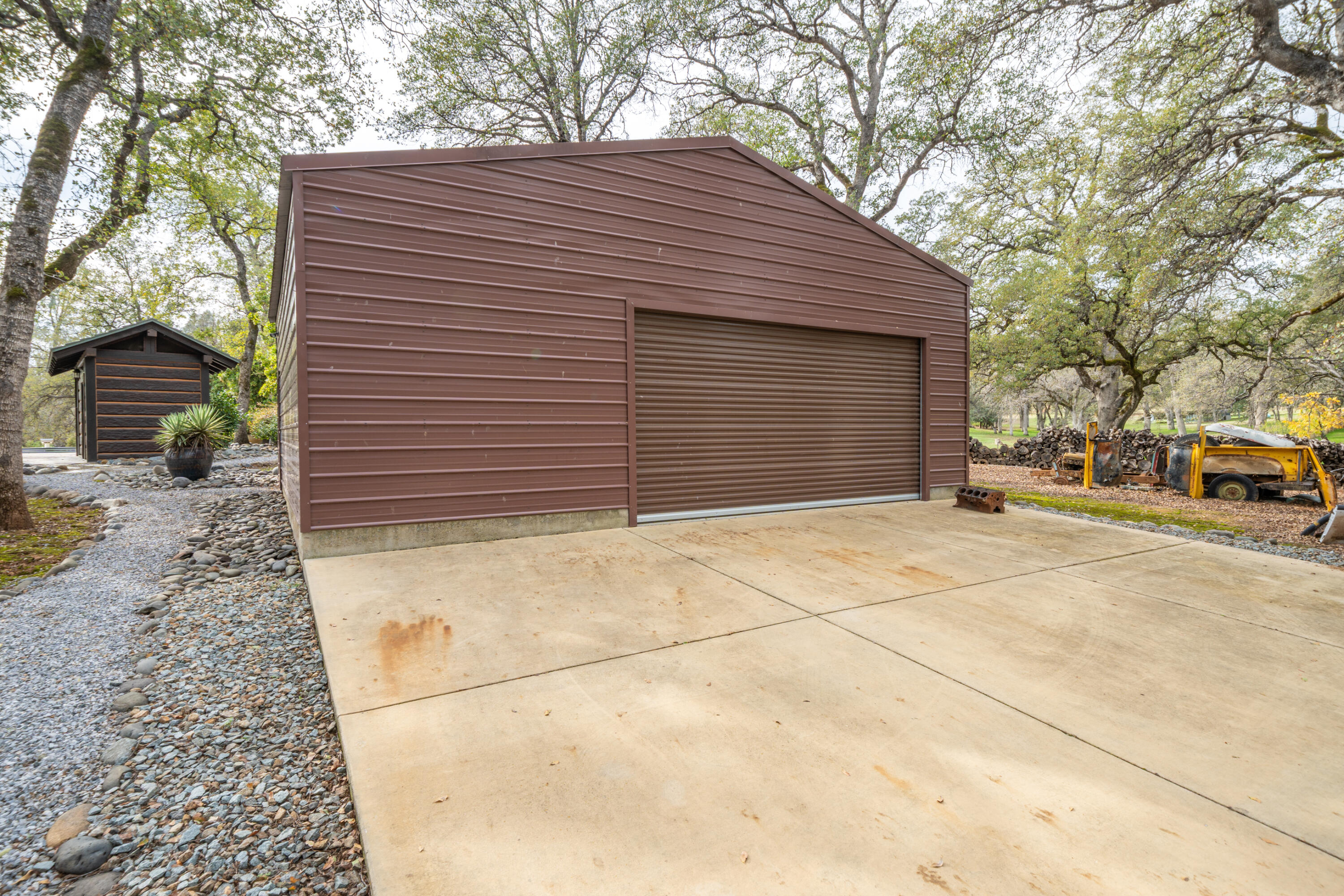 15900 El Camino Robles Road Redding, CA 96001 - Photo 89 of 116 a front view of a house with a garage