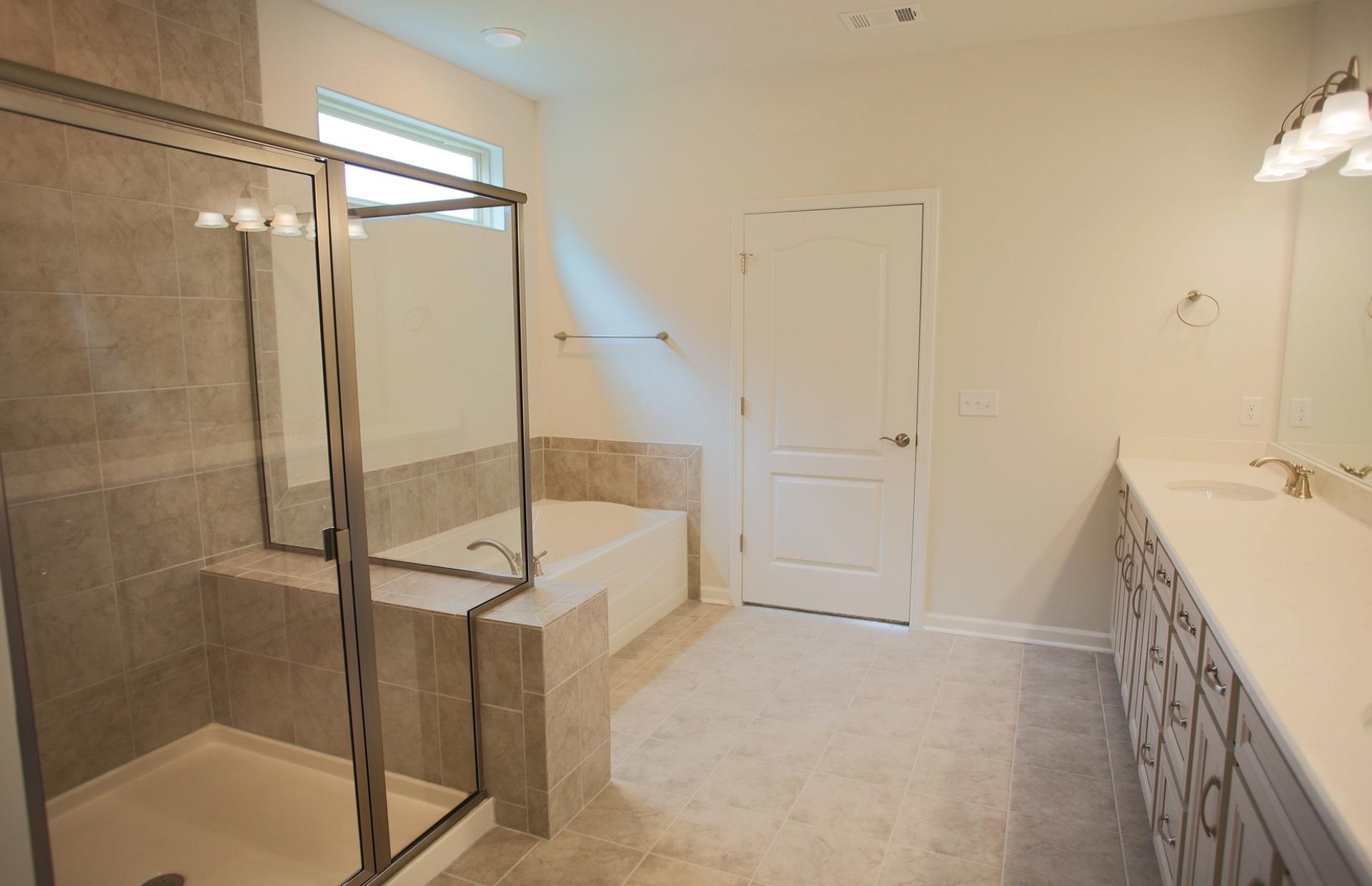 1032 Coffee Ridge, Unit 208 Spring Hill, TN 37174 - Photo 21 of 28 Soaker Tub & Tiled Shower