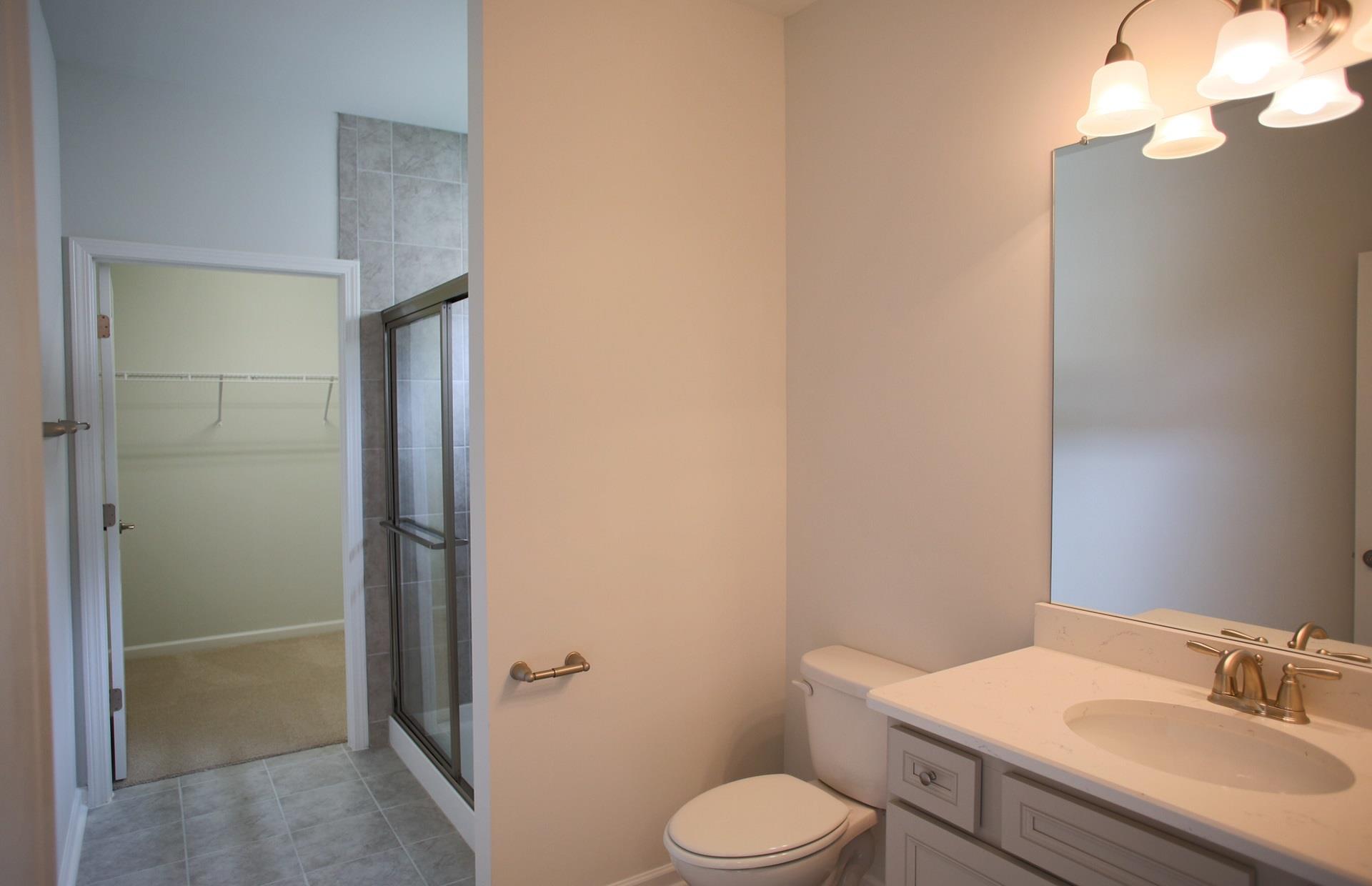 1032 Coffee Ridge, Unit 208 Spring Hill, TN 37174 - Photo 23 of 28 Guest Bathroom with Tiled Shower