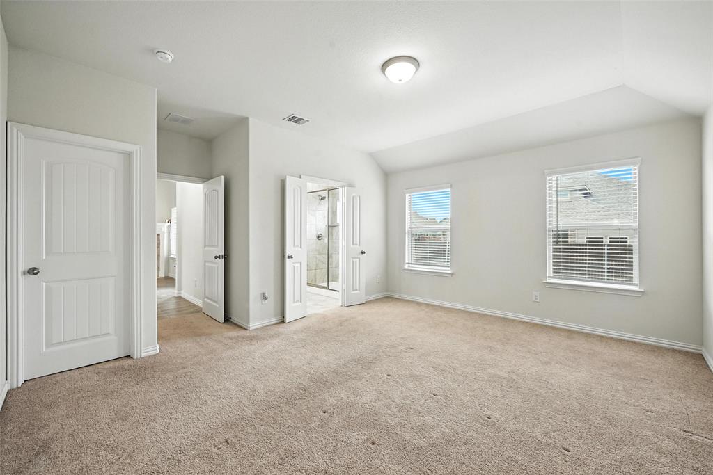 5 Pheasant Run Sanger, TX 76266 - Photo 19 of 27 an empty room with windows and closet