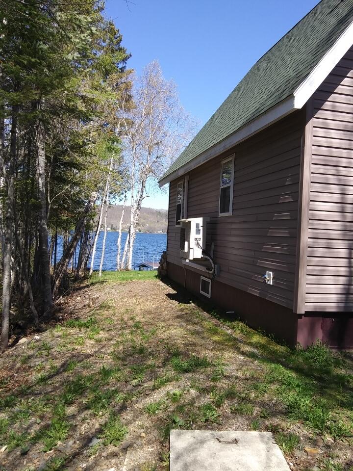 234 W Road Portage Lake, ME 04768 - Photo 3 of 27 heat pump outdoor unit