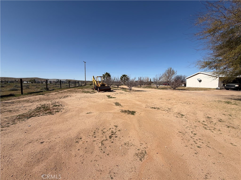 36633 Hidden River Road Hinkley, CA 92347 - Photo 11 of 19 a view of a yard with snow on the road