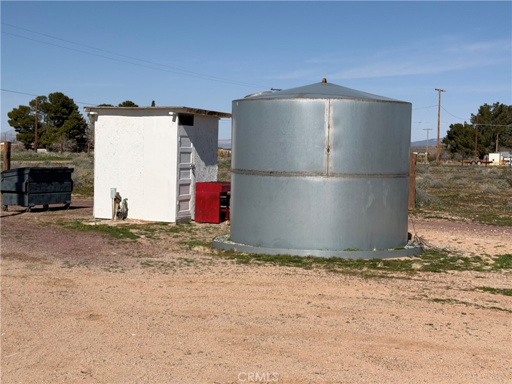 36633 Hidden River Road Hinkley, CA 92347 - Photo 16 of 19 a white refrigerator freezer sitting in a kitchen