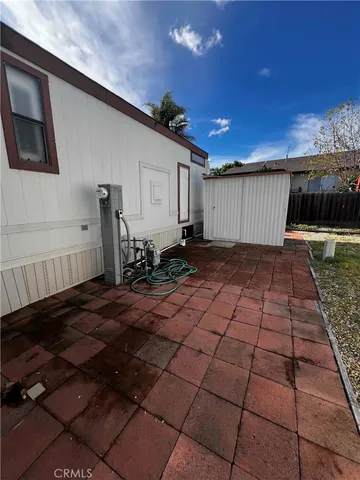 a view of a backyard of the house