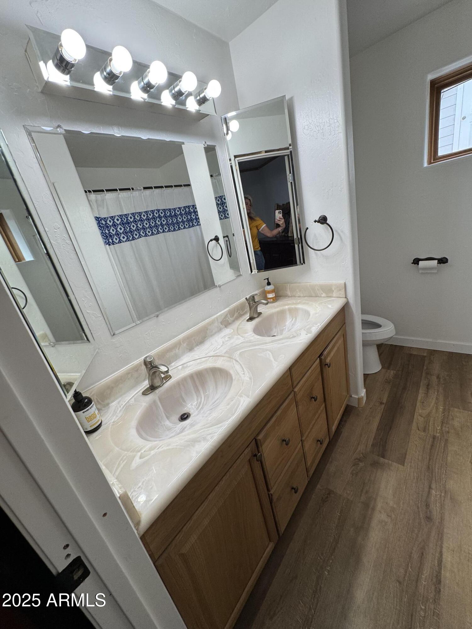 1905 Green Valley Road Heber, AZ 85928 - Photo 14 of 28 a spacious bathroom with a granite countertop double vanity sink a mirror and lamp