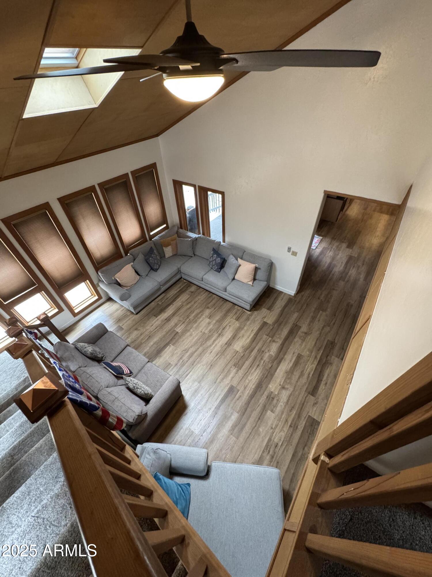 1905 Green Valley Road Heber, AZ 85928 - Photo 17 of 28 a view of an empty room with wooden floor