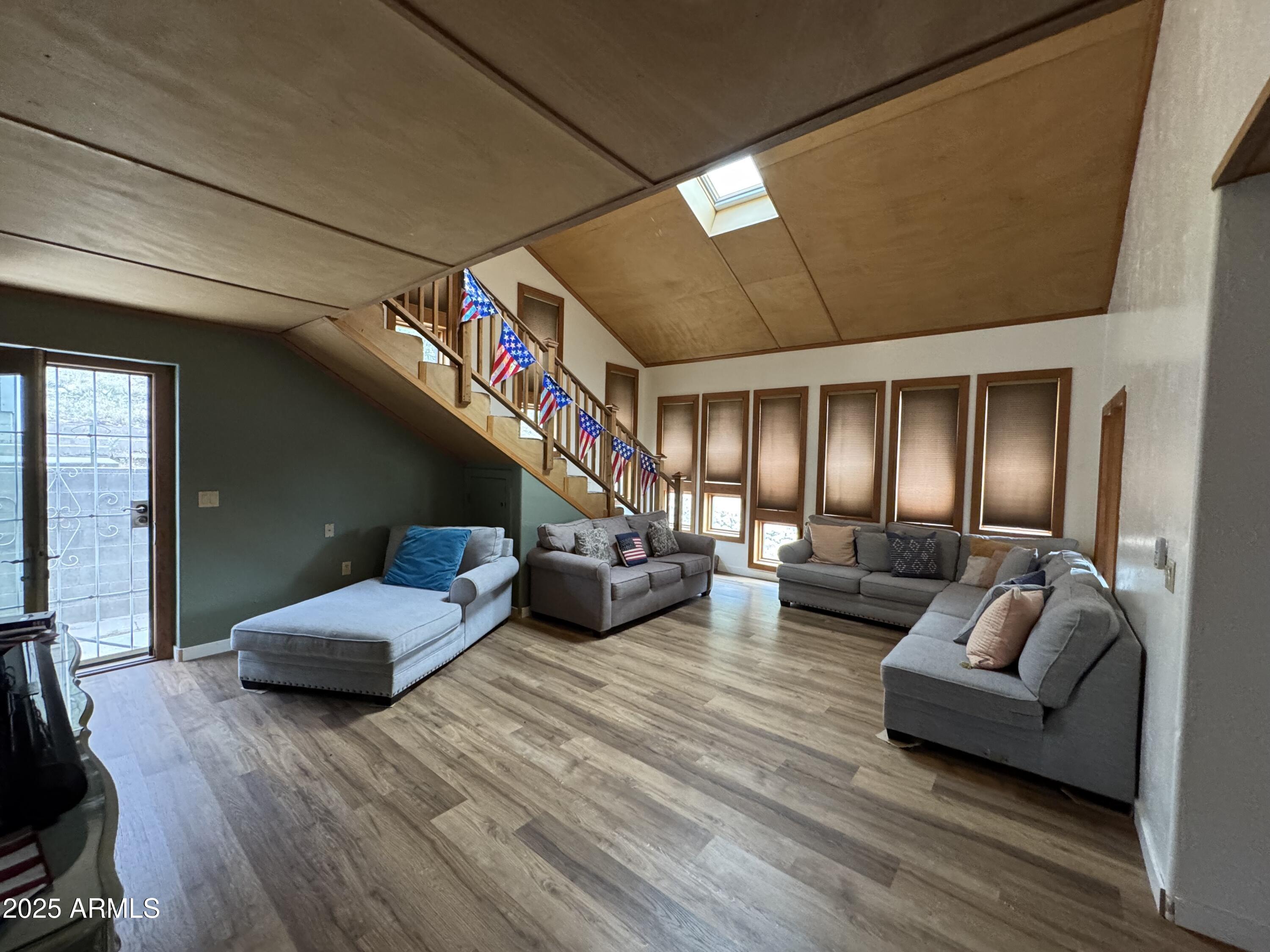 1905 Green Valley Road Heber, AZ 85928 - Photo 2 of 28 a living room with furniture and wooden floor