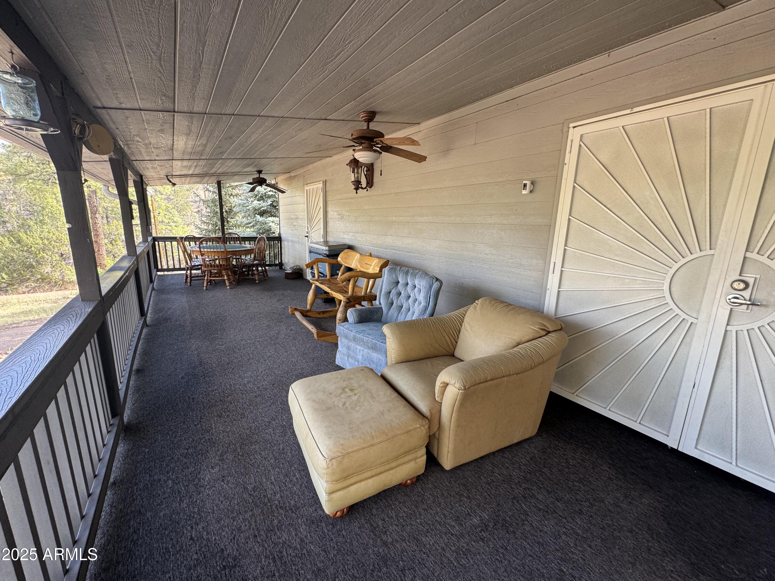 1905 Green Valley Road Heber, AZ 85928 - Photo 23 of 28 a living room with furniture and a window