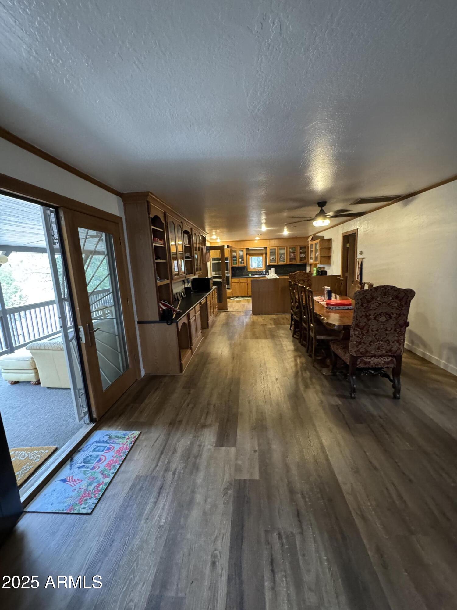 1905 Green Valley Road Heber, AZ 85928 - Photo 5 of 28 a living room with furniture and a wooden floor