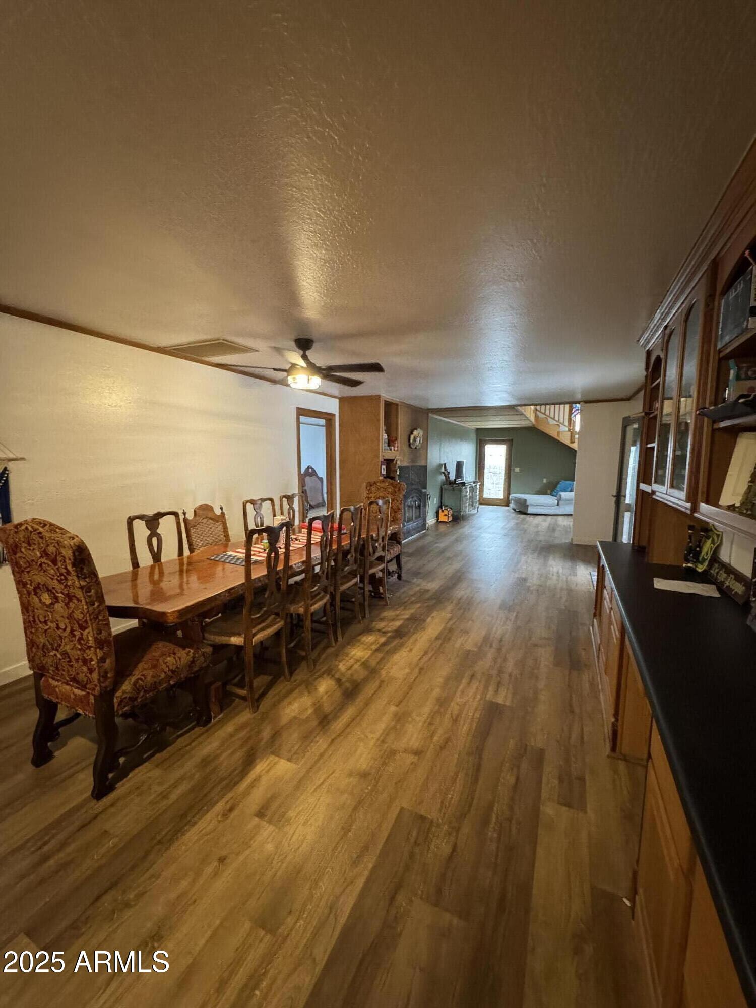 1905 Green Valley Road Heber, AZ 85928 - Photo 8 of 28 a living room with lots of furniture and a view of bedroom