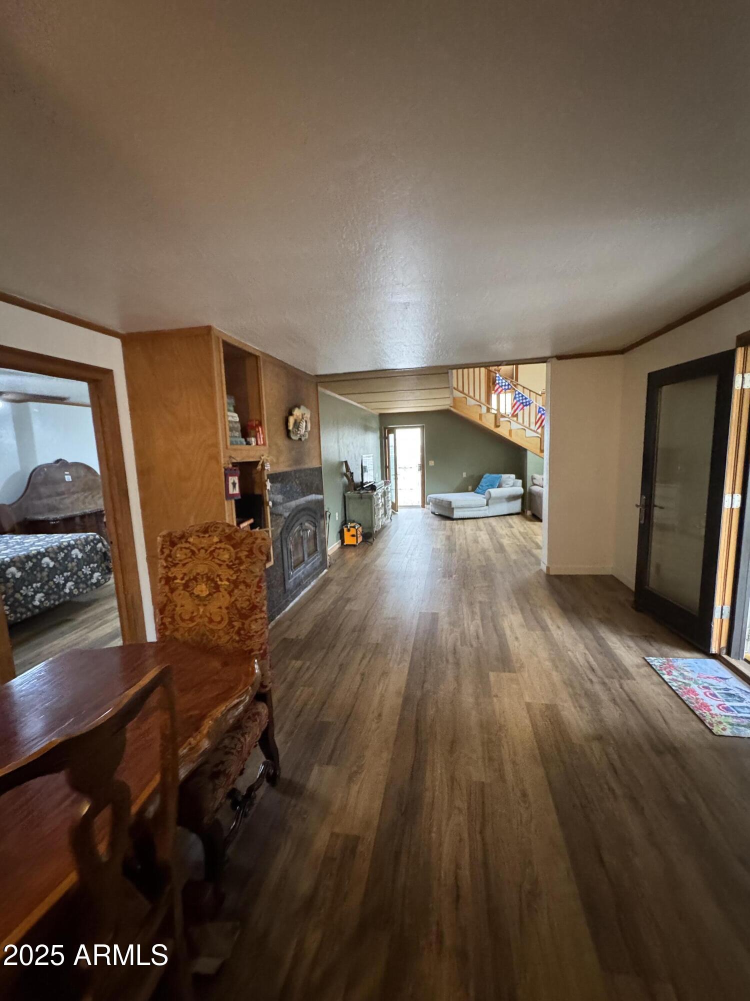 1905 Green Valley Road Heber, AZ 85928 - Photo 9 of 28 a living room with furniture and a wooden floor