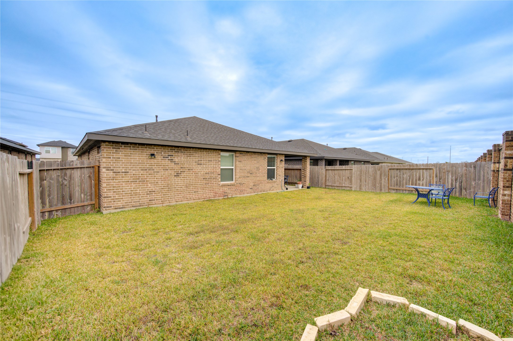 29522 Cayenne Circle Katy, TX 77494 - Photo 11 of 46 a backyard of a house with wooden fence