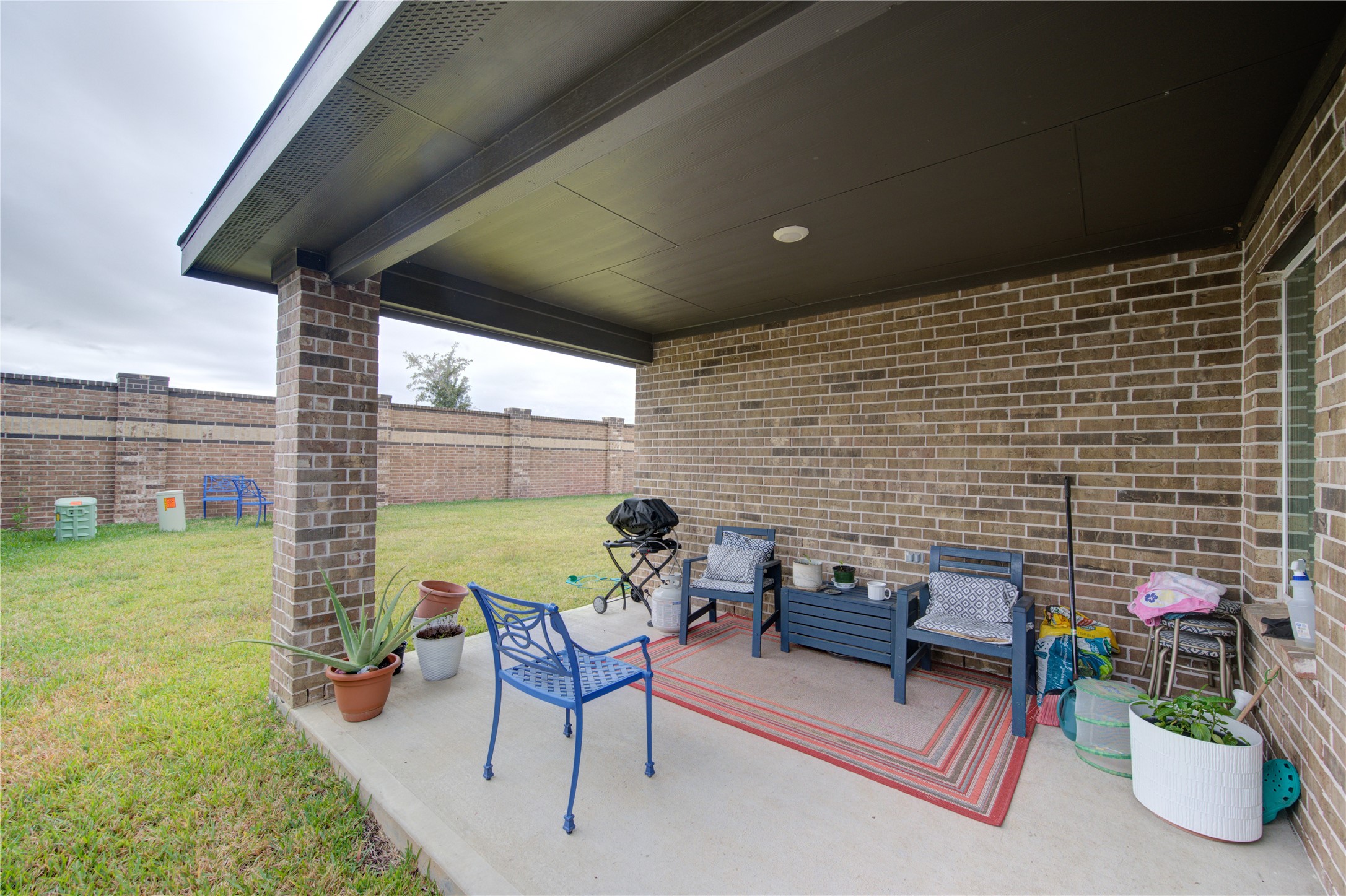 29522 Cayenne Circle Katy, TX 77494 - Photo 14 of 46 a building outdoor space with patio furniture and potted plants