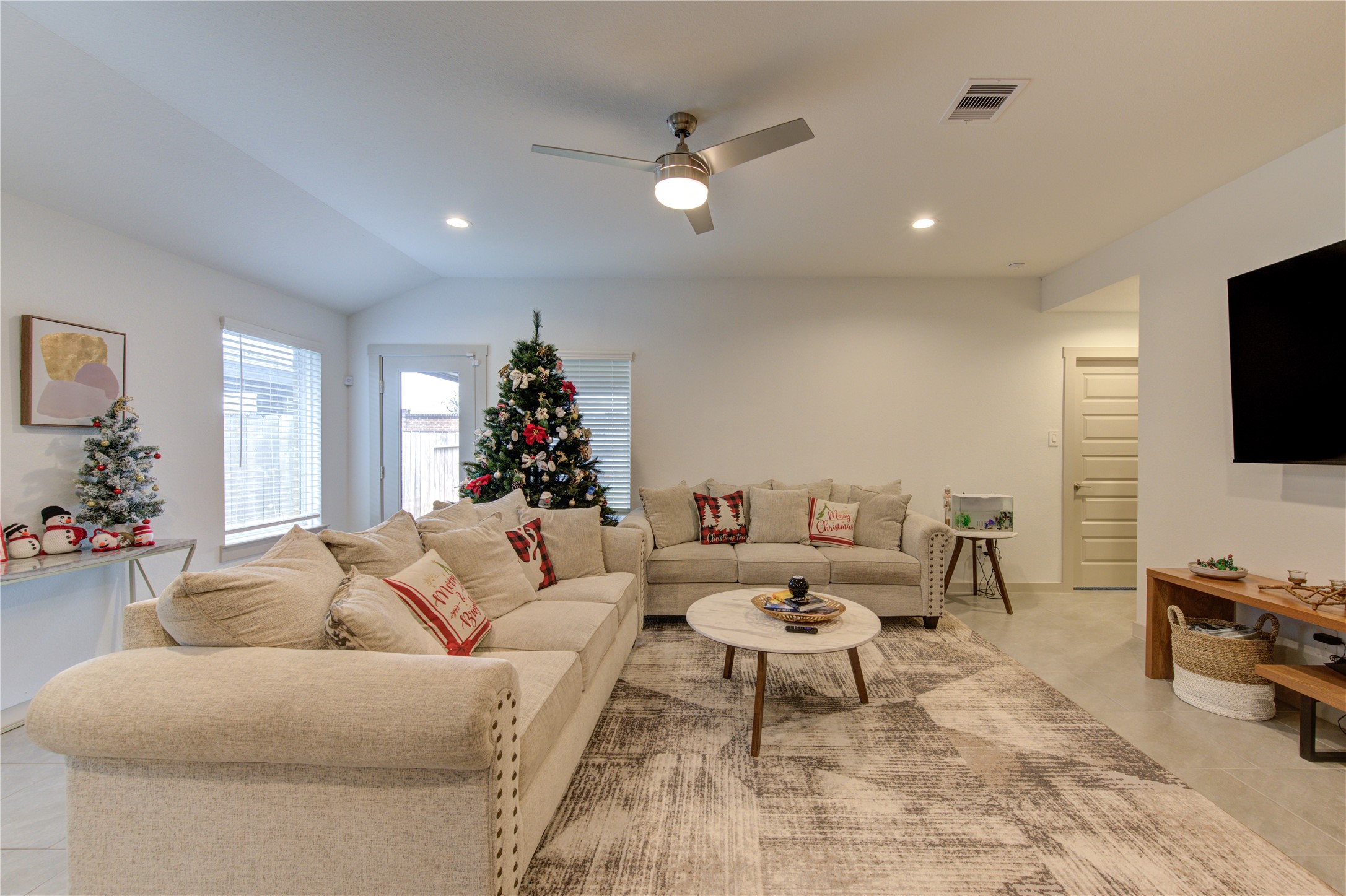 29522 Cayenne Circle Katy, TX 77494 - Photo 30 of 46 a living room with furniture and a flat screen tv