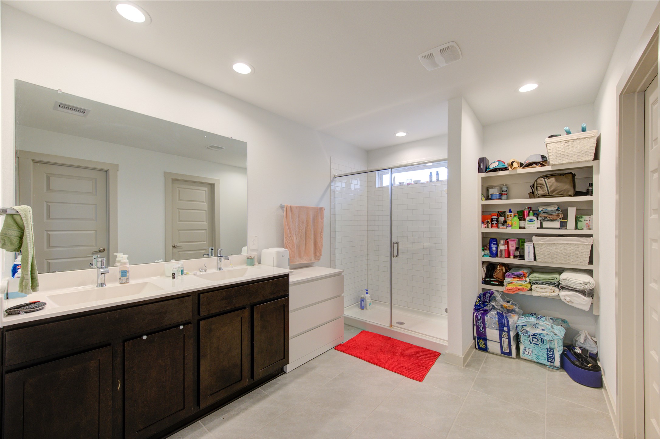 29522 Cayenne Circle Katy, TX 77494 - Photo 38 of 46 a en suite bathroom with double vanity sinks and a shower