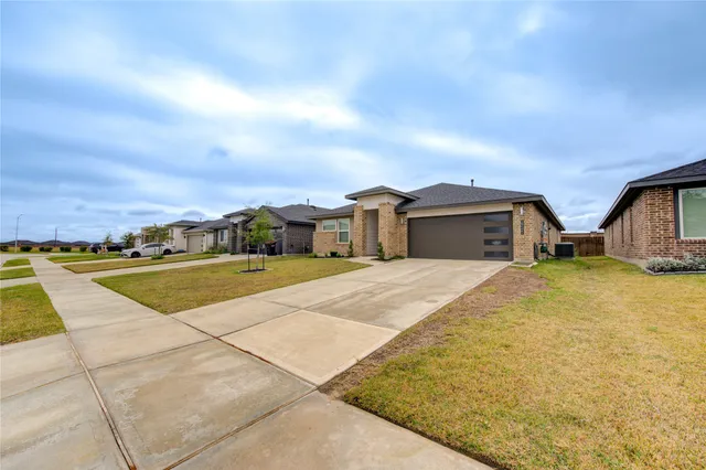 a view of house with outdoor space