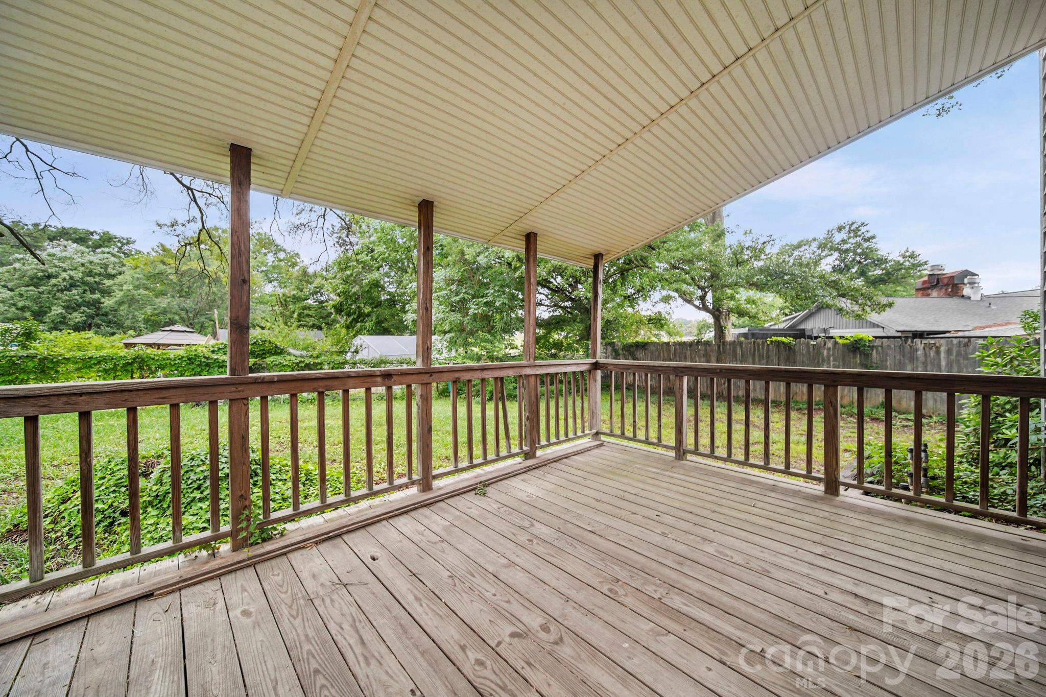 1109 Union Road Gastonia, NC 28054 - Photo 20 of 44 a balcony with trees in front of it