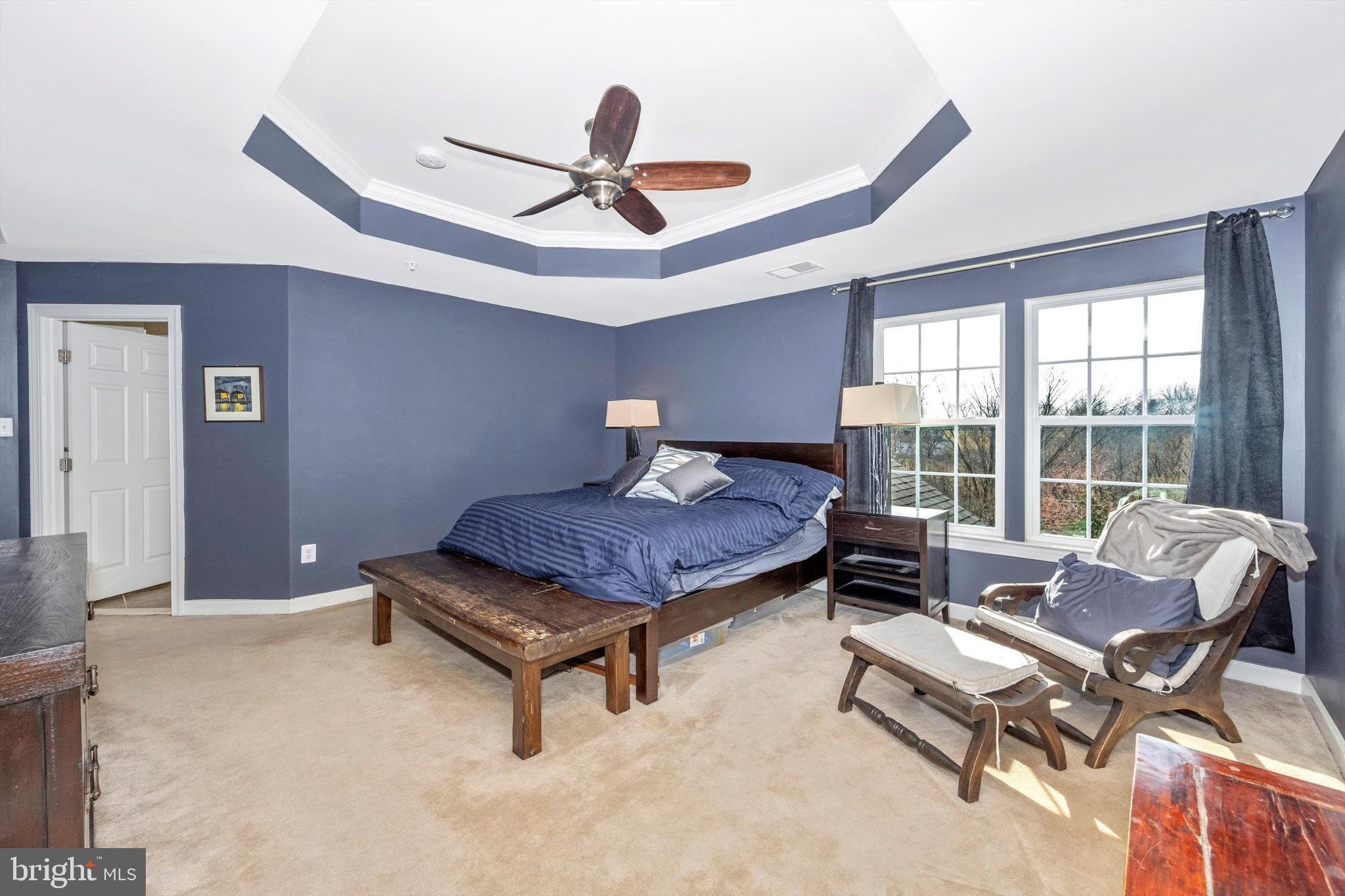 9121 Bealls Farm Road Frederick, MD 21704 - Photo 26 of 63 a living room with furniture and a ceiling fan