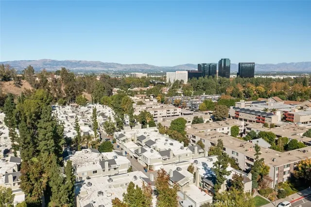 an aerial view of residential building with parking space