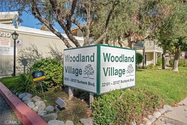 a sign on the side of the road