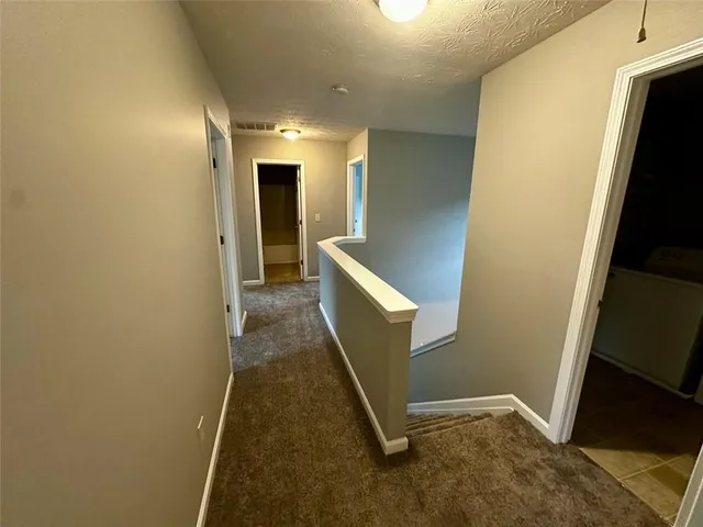 a view of entryway with a hallway