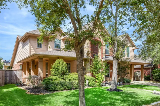 a picture of a bathroom with a shower