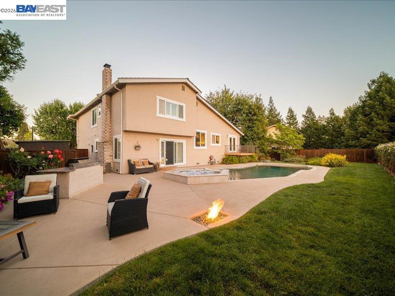 17 Suva Court San Ramon, CA 94582 - Photo 35 of 47 a view of a house with swimming pool and sitting area