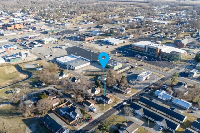 an aerial view of a city with lots of residential buildings