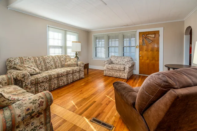 a living room with furniture and a couch