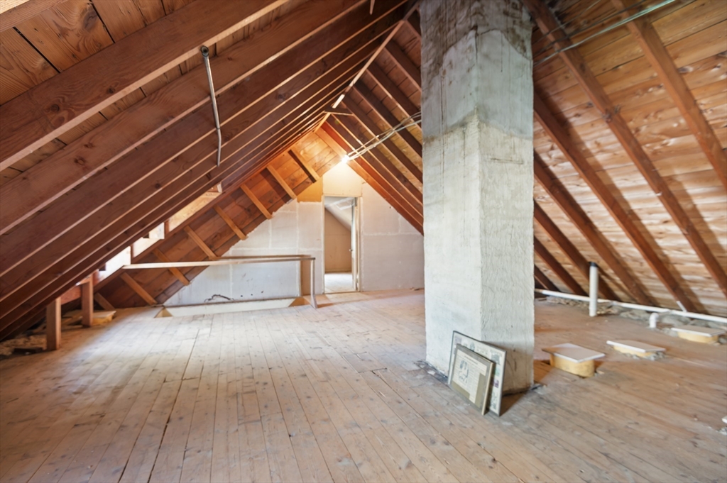 110 Linden Street Hamilton, MA 01982 - Photo 19 of 25 an empty room with wooden floor and windows