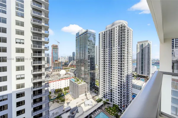 a view of city with tall buildings