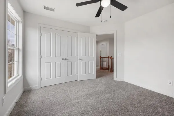 a bathroom with a sink a shower and a mirror