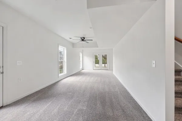 a view of a livingroom with a ceiling fan