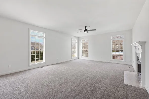 a view of a livingroom with a ceiling fan